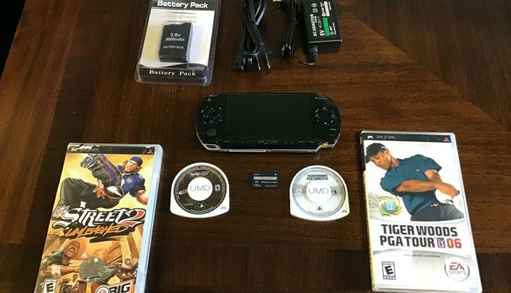 Sony PSP 1001 advance with 2 video games,1 contemporary battery,1 contemporary charger, 1 memory card.