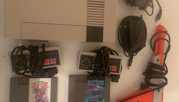 NES console With All Hook Ups, Controllers, And a pair of Video games