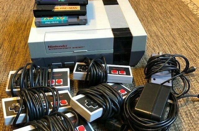 Long-established Nintendo NES-001 1985 W/Additional Controllers & 3 Games Tetris Ms/Pac Man
