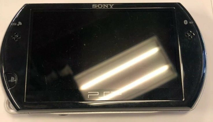 Sony PSP GO Birth Edition 16GB Piano Dim Handheld System Works Broad