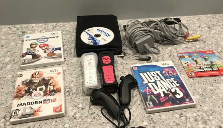 Wii Console With Controllers, Nunchuks And Video games