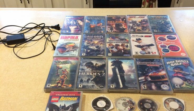 PlayStation PSP Handheld W/ 19 Video games 1 Film Model 3001 Uncommon Video games