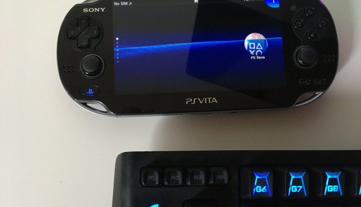 Sony PS Vita OLED With 4 Games And Controller Holder Mannequin # PCH-1103 WiFi