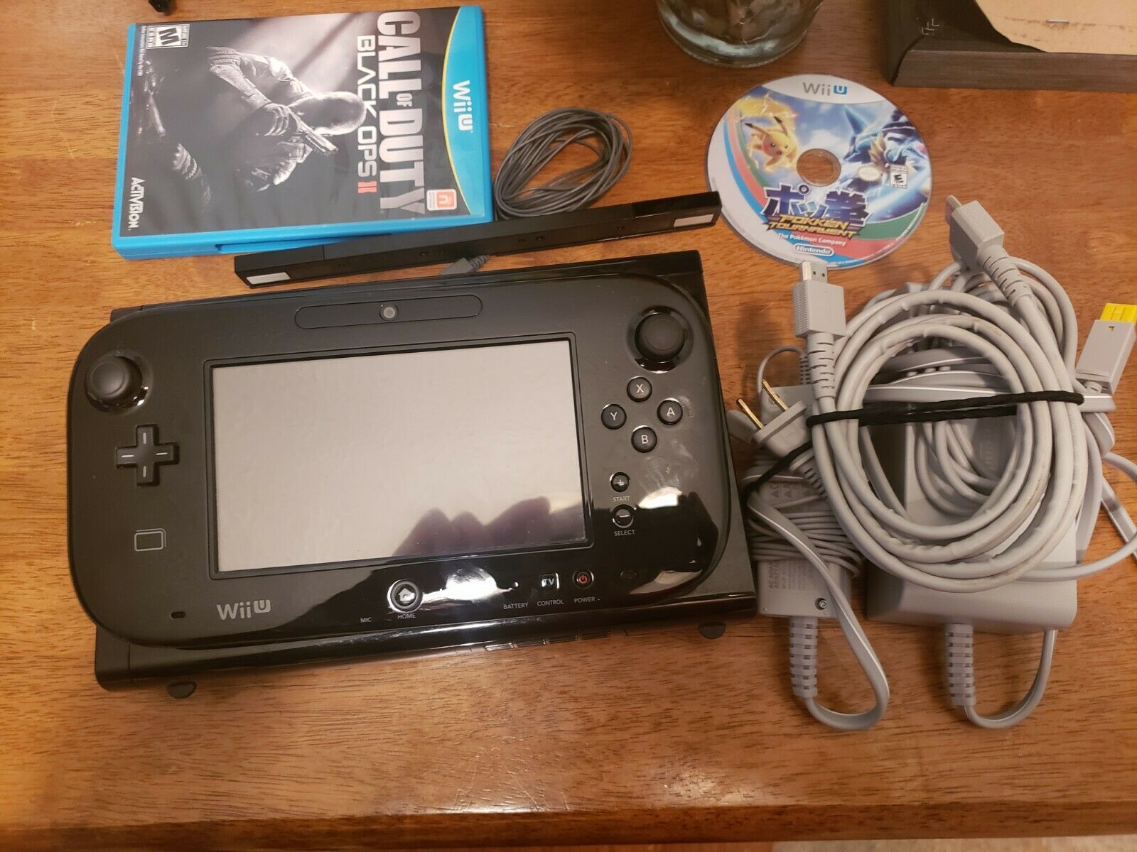 Nintendo Wii U 32GB Design with two video games, sensor bar, all cords