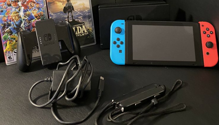 Nintendo Switch Purple And Blue Joycon + 2 Video games