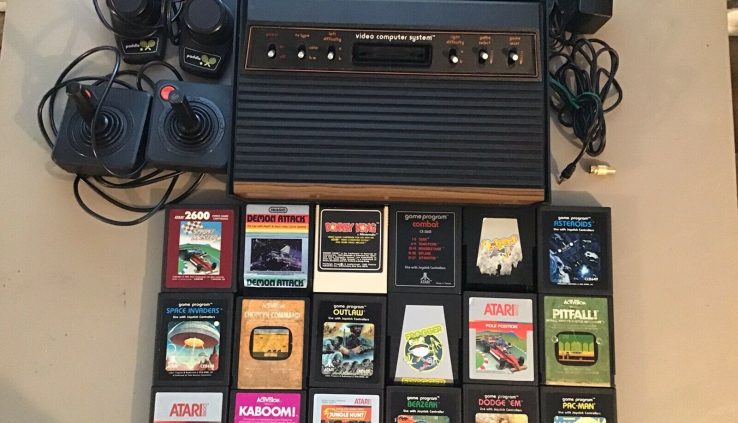 Atari 2600 Console, 2 Controllers, AC Adapter & 18 Video games – Examined & Works