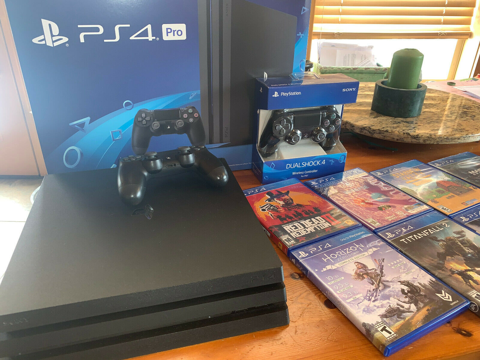 PS4 Expert 1TB (4K) + 2 Controllers + 14 Games on 