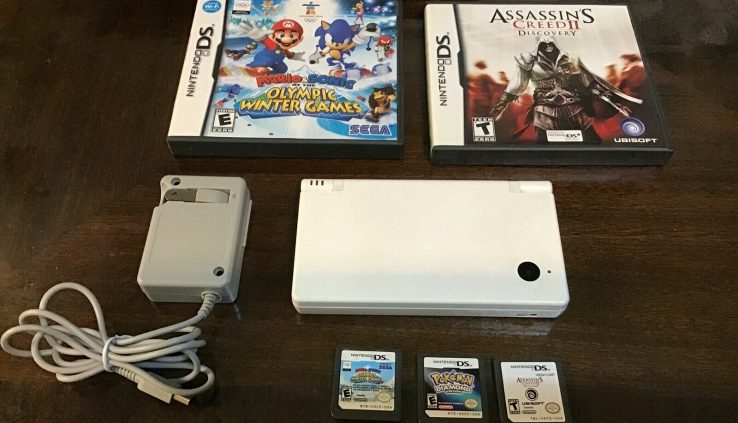 Nintendo DSi Handheld Game Console – White 3 Video games and charger tested works.