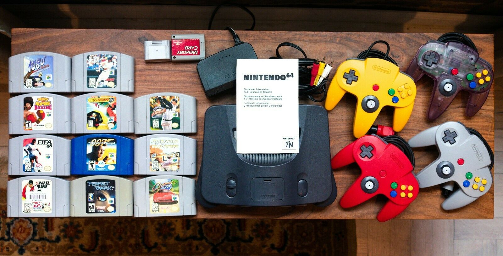 Nintendo 64 + 11 games + 4 legitimate controllers + accessories