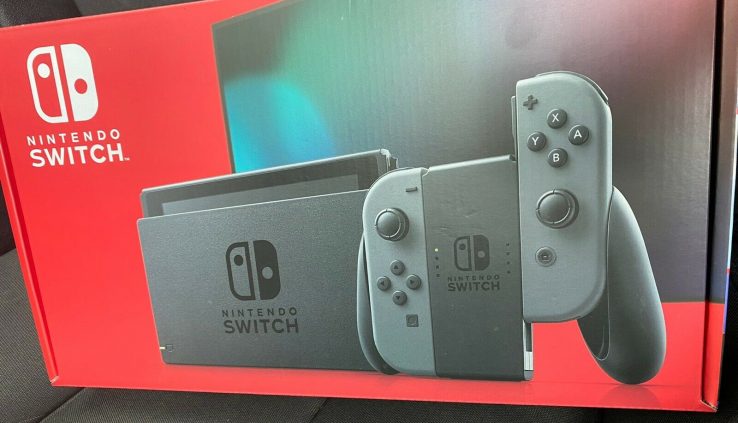***Contemporary Sealed Nintendo Switch 32GB V2 Console with Gray Joy-Con In Hand***