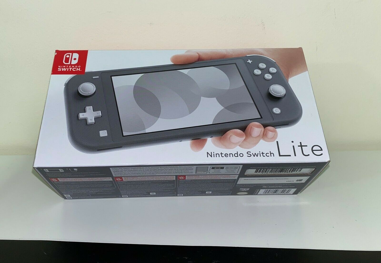 Nintendo Switch Lite GRAY Console - Designate Unique Manufacturing ...