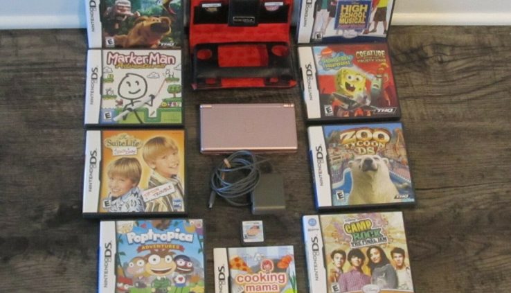 Nintendo DS Lite Coral Purple Sport System with case, adapter,  & 12 video games.