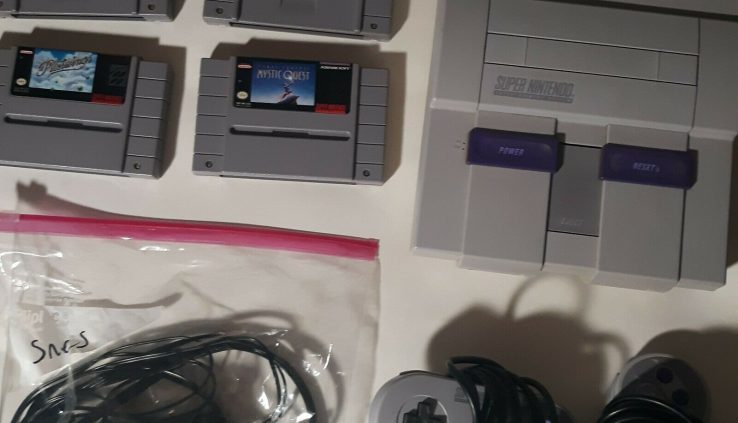 Sizable Nintendo SNES CONSOLE WITH GAMES TESTED WORKING WITH AUTHENTIC…