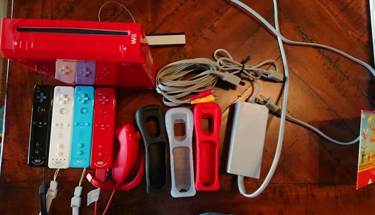 Nintendo Wii twenty fifth Anniversary Crimson Console + 4 controllers + 4 games