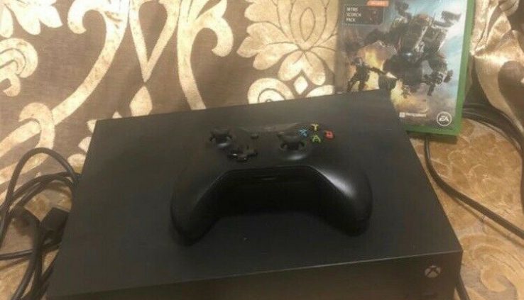 Microsoft Xbox One X 1TB Murky Fleshy Equipment + Titanfall 2 Recreation