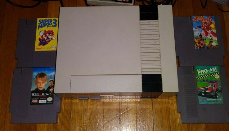 Nintendo NES bundle with console, 4 games & 2 controllers tested and dealing!