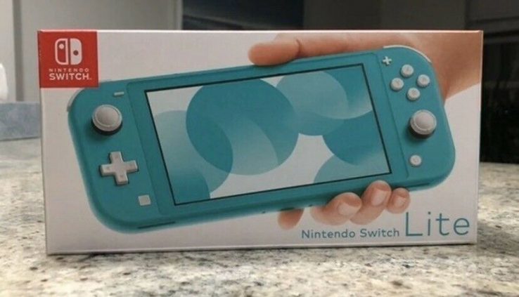 Attach NewNintendo Swap Lite Handheld Console – Turquoise In Hand