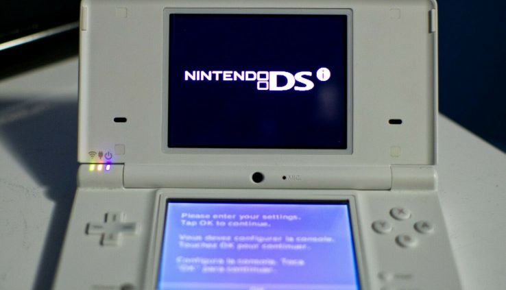 Veteran White Nintendo DSi Handheld Sport Console