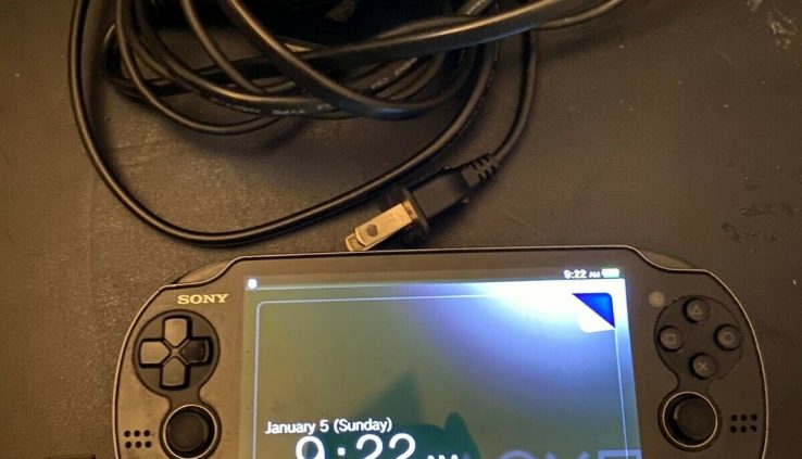 Sony PlayStation Vita Handheld System with 8 GB Memory/Energy Cord/Case, Examined