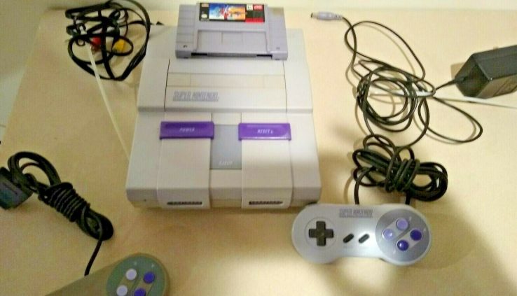 Wide Nintendo SNES Console , controllers and game