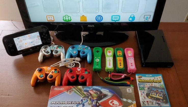 Wii U Console w/ 4 additional Wii Remotes, 4 GameCube model controllers, and 3 Video games