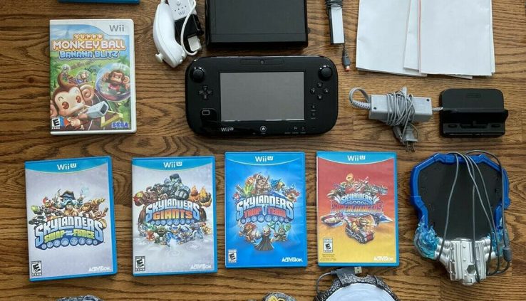Nintendo Wii U 32GB Deluxe Bundle with 6 Video games, Gamepad, Wii mote plus extras