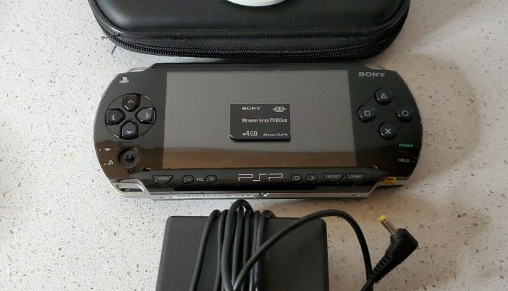 Sony PSP 1000 – Dusky examined works w charger 4GB and movie study description